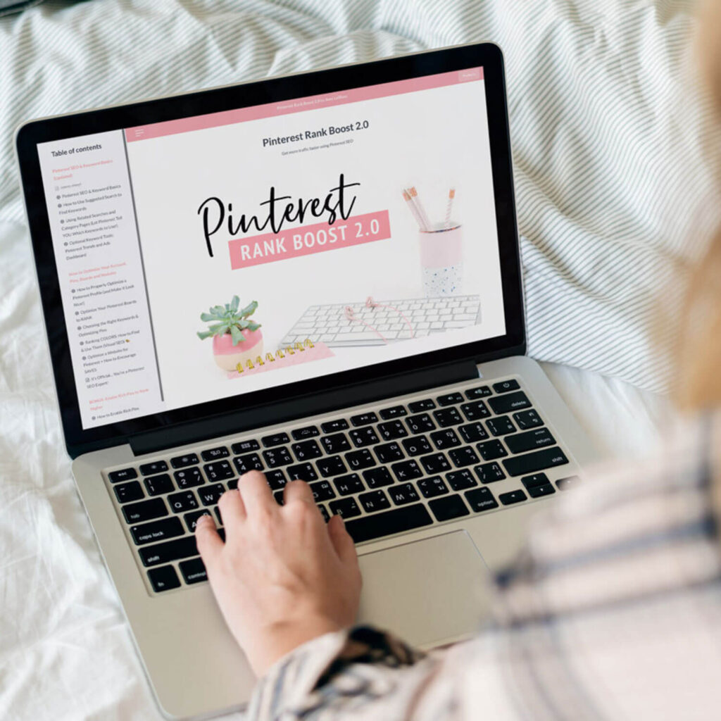 pinterest rank boost course on a laptop screen on a bed